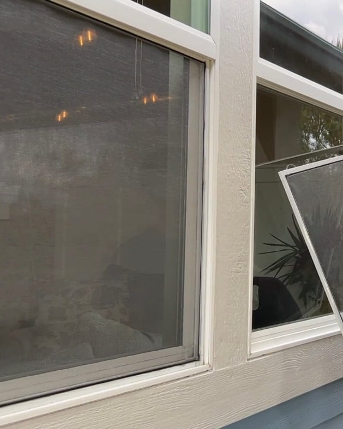 Real photo of our crew installing a new window screen on a Parker-area job
