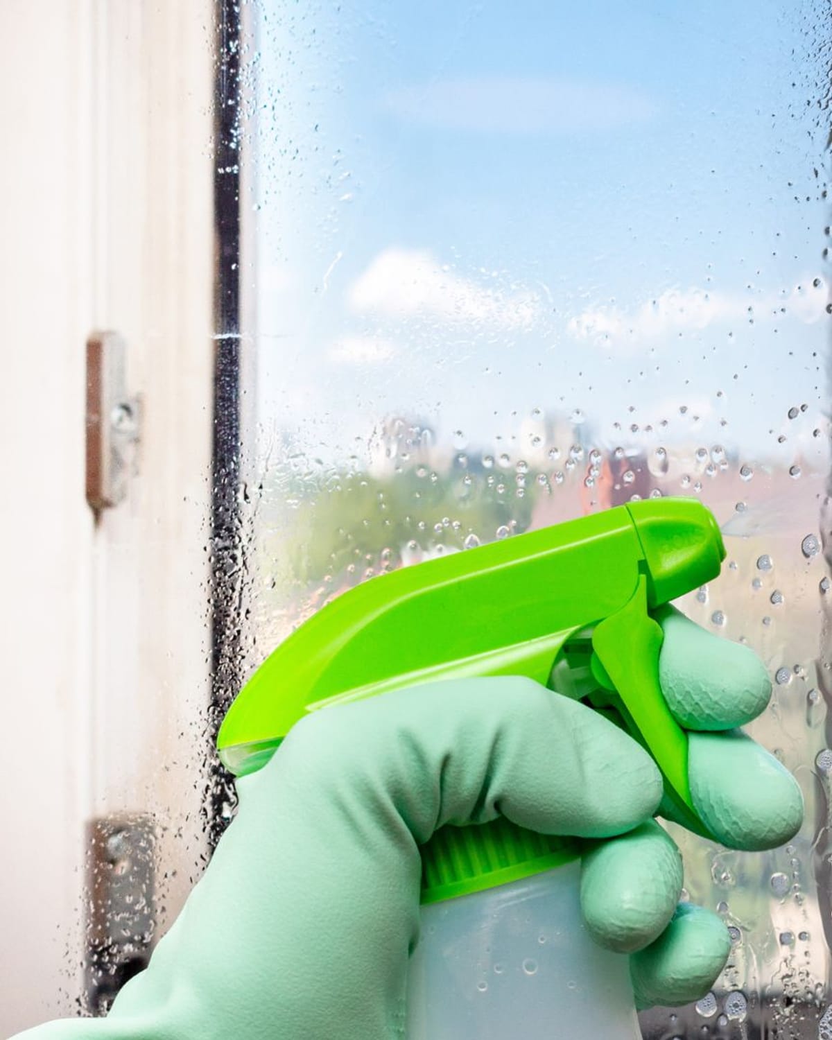 Fingerprints and smudges on commercial entry-door glass before cleaning
